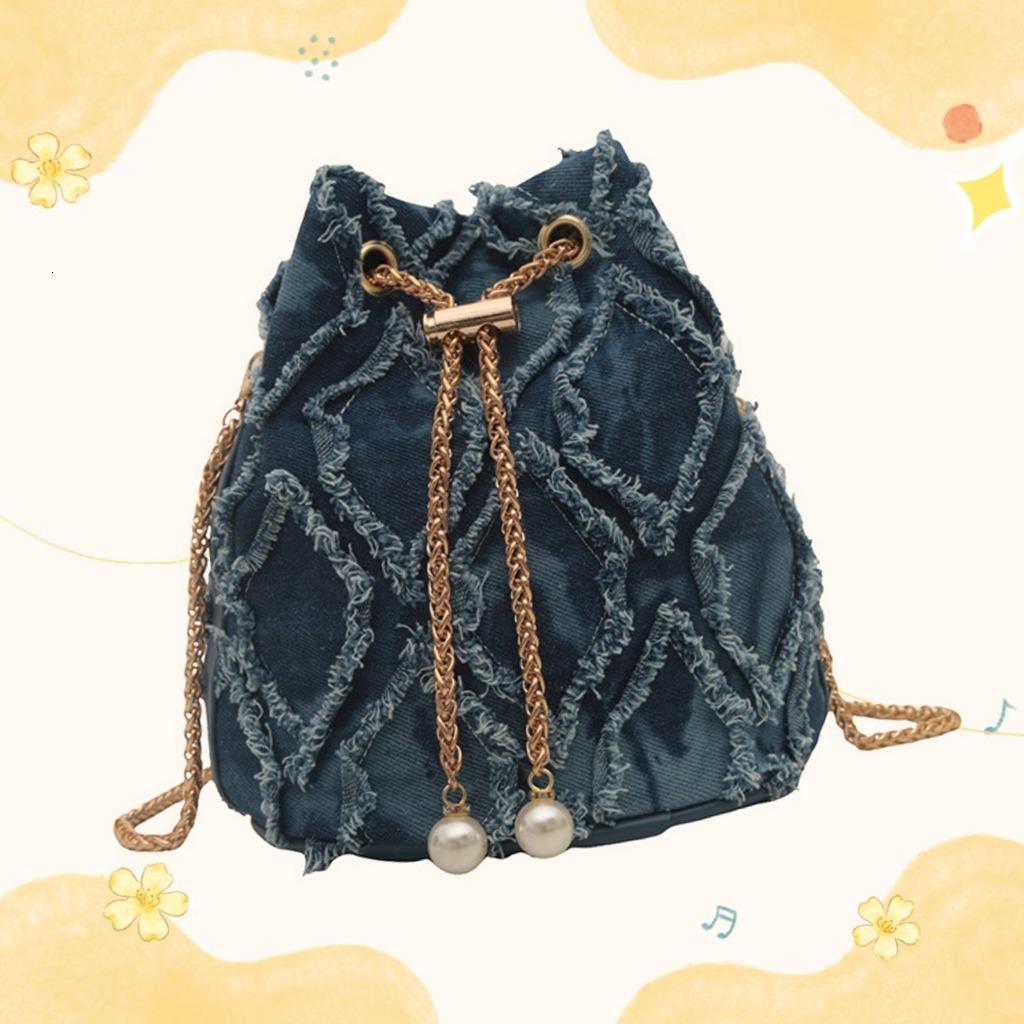 Stylish tasselled denim bucket bag – women's jeans crossbody drawstring bag